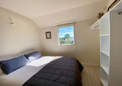 Postel nebo postele na pokoji v ubytování Ngahere Ski Lodge - Methven