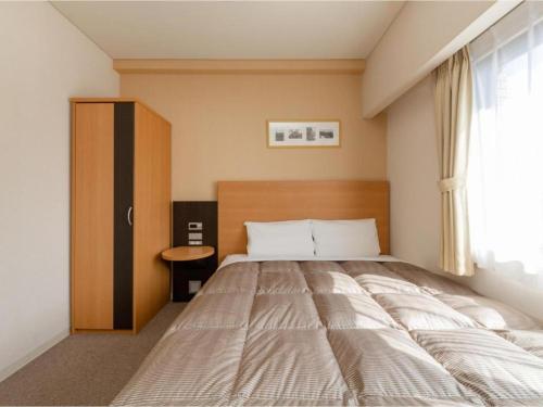 Katil atau katil-katil dalam bilik di The OneFive Okayama - Vacation STAY 41846v