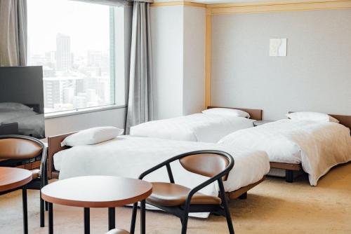 札幌プリンスホテルにあるベッド