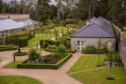 an aerial view of a garden with a building at Lough Eske Castle in Donegal