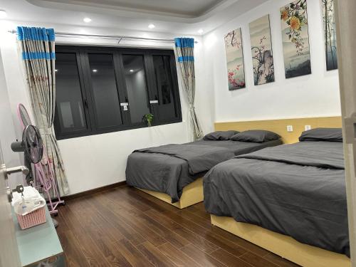 Кровать или кровати в номере Rose house