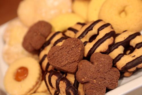 a plate of pastries with chocolate cookies and marshmallows at Hotel Cristallo in Udine