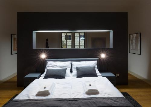 Cama o camas de una habitación en Zámecké apartmány Litomyšl