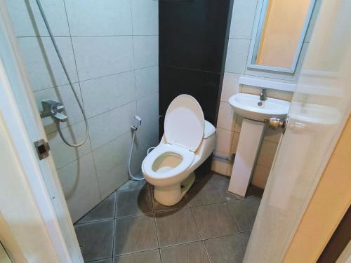 Koupelna v ubytování Hotel Karunia PKPRI