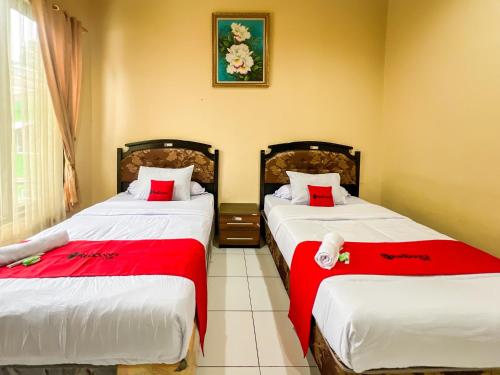Cama o camas de una habitación en RedDoorz at Dieng 0KM