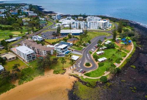 an aerial view of a resort on the beach at Bargara Beach Bliss in Bargara