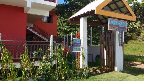a sign for a garden in front of a house at Bora Bora Temporada in Gamboa