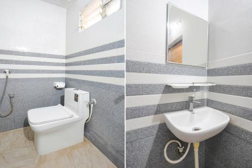 Un baño de FabExpress Royal N Comforts - Nr Shivoham Shiva Temple