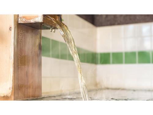 a stream of water coming out of a sink at Japari Tateyama - Vacation STAY 75921v in Tateyama