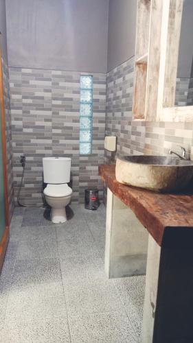 Gambar di galeri bagi Harris surf villa di Pulukan