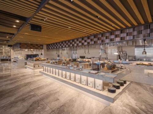 Restoran või mõni muu söögikoht majutusasutuses Amber Pure Hill Hotels & Resorts Jeju