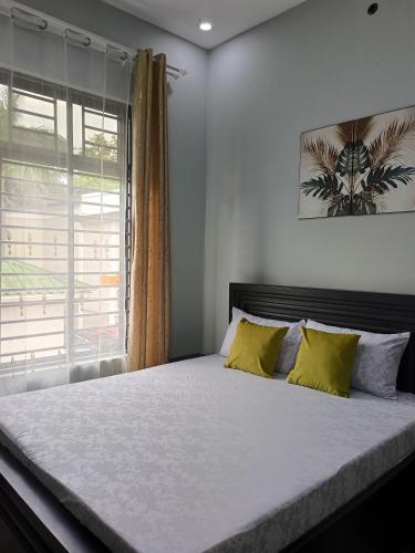 Katil atau katil-katil dalam bilik di Thanil homes