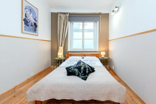 Posteľ alebo postele v izbe v ubytovaní Prime Location Apartment