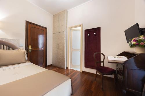 Cama o camas de una habitación en Hotel Forum