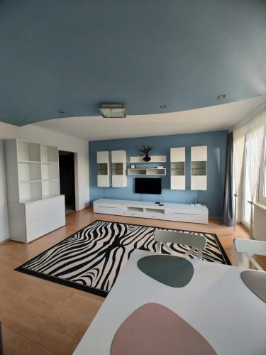 En eller flere senge i et værelse på Apartament Jodełka