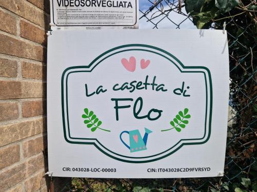 a sign for a floridaida fiesta festival at La casetta di Flo in Montecosaro