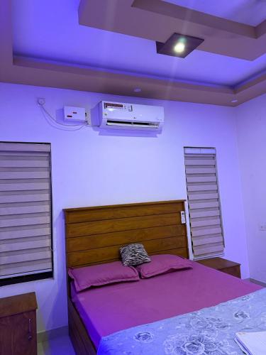 Cama o camas de una habitación en COSTAL Elegance 25 Varkala