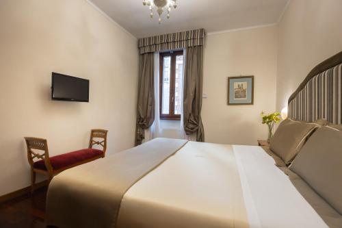 Cama o camas de una habitación en Hotel Forum
