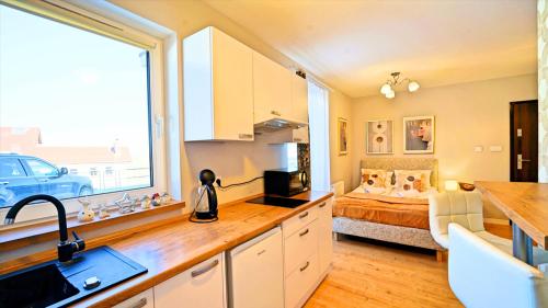 Posteľ alebo postele v izbe v ubytovaní Apartamenty EverySky Karpacz - Wilcza 3F_P