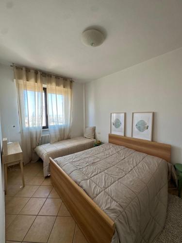 Ένα ή περισσότερα κρεβάτια σε δωμάτιο στο Residence Ottoemezzo int 2