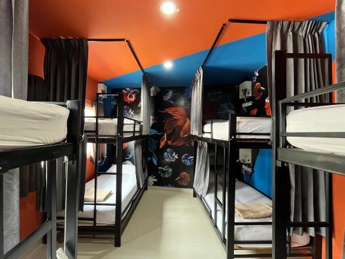 a group of bunk beds in a room at Everyday Bangkok Hostel in Bangkok