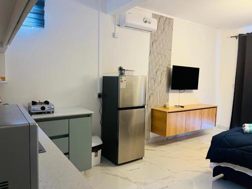 TV i/ili multimedijalni sistem u objektu Refresh Holidays