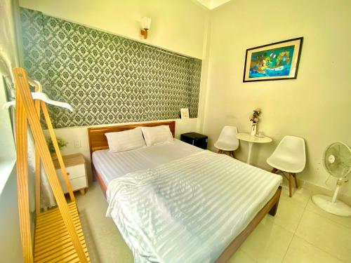 Postel nebo postele na pokoji v ubytování Memory Homestay Hue