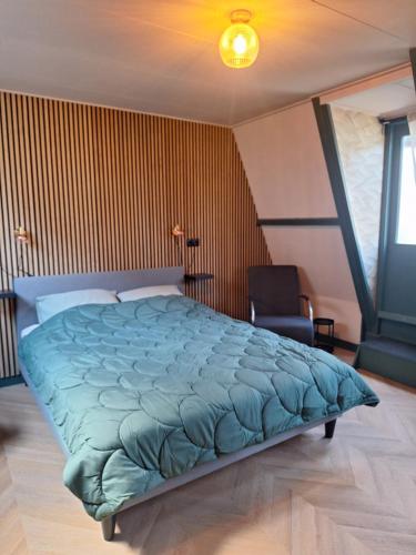 Ένα ή περισσότερα κρεβάτια σε δωμάτιο στο 1 aan Duin