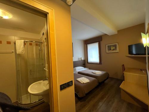 Koupelna v ubytování Damodoro Hotel