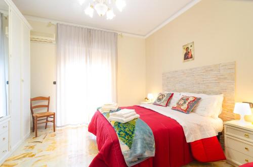 Ένα ή περισσότερα κρεβάτια σε δωμάτιο στο Casa Aurora a due passi dalla ferrovia