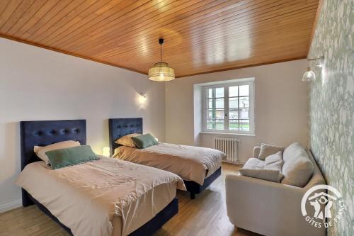 Ένα ή περισσότερα κρεβάτια σε δωμάτιο στο La maison camelia