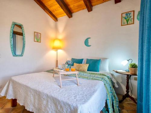 Una cama o camas en una habitación de Apartment 4 beds in Residence in Golfo Aranci just 150 mt from the sea