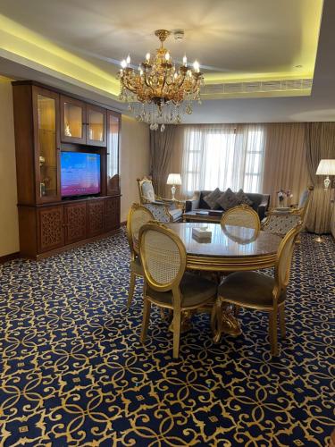 TV a/nebo společenská místnost v ubytování Al Rahden Hotel