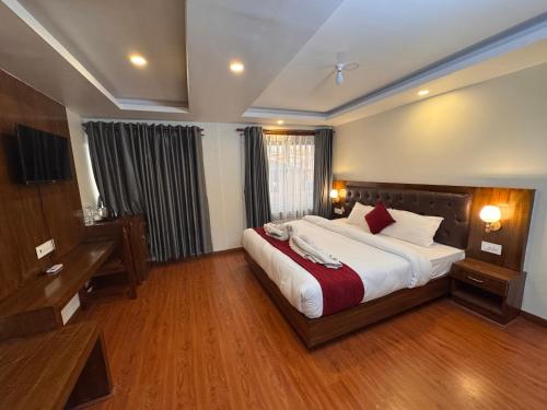 Postel nebo postele na pokoji v ubytování Stupa Boutique Hotel
