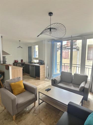 Photo de la galerie de l'établissement T4 de Standing au Centre de Carcassonne - Confort et Authenticité, à Carcassonne