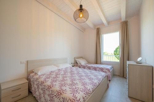 Ένα ή περισσότερα κρεβάτια σε δωμάτιο στο Wave Island Torre B23