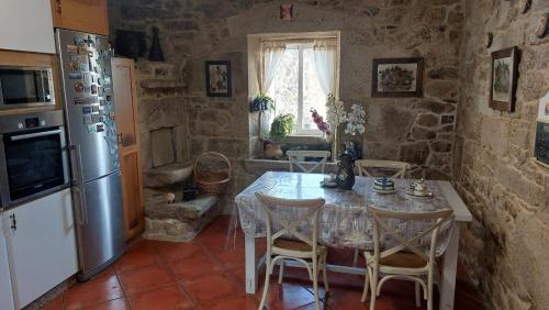 Η κουζίνα ή μικρή κουζίνα στο Casa Kamelias