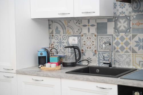 Kuchyň nebo kuchyňský kout v ubytování Casa Viberti, Dimora storica con vista mozzafiato sulle Langhe