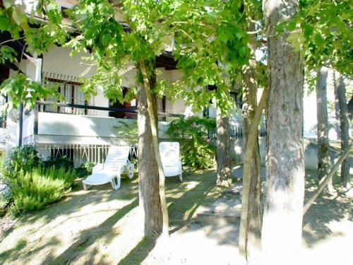 Imagem da galeria de Large row house with private fenced garden for 10 guests in Lignano Pineta em Lignano Sabbiadoro
