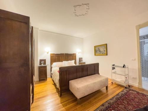 Postel nebo postele na pokoji v ubytování Casa Viberti, Dimora storica con vista mozzafiato sulle Langhe