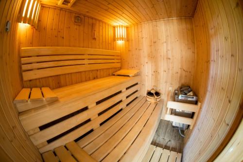 an inside view of a wooden sauna at Kociewska Polana - domki nad jeziorem in Sulnówko