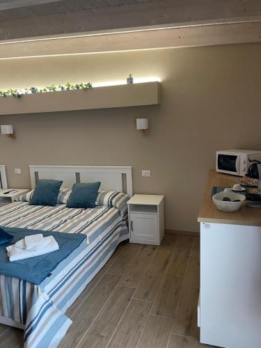 Ένα ή περισσότερα κρεβάτια σε δωμάτιο στο Paradise Rooms Apartment