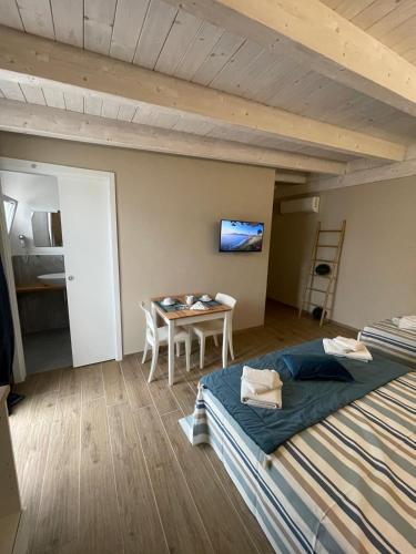 Ένα ή περισσότερα κρεβάτια σε δωμάτιο στο Paradise Rooms Apartment