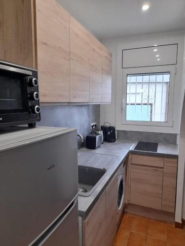 Casita con jardín cerca playa AV-60