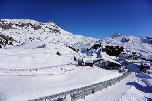 a ski lodge in the snow on a mountain at Haus Aida, Bettmeralp in Bettmeralp