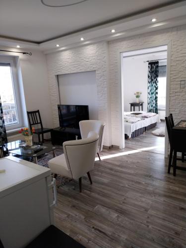 TV a/nebo společenská místnost v ubytování Rozinka apartman