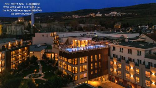 an aerial view of a building with lights on at Hotel Villa Toskana in Leimen