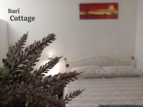 Postel nebo postele na pokoji v ubytování Bari Cottage