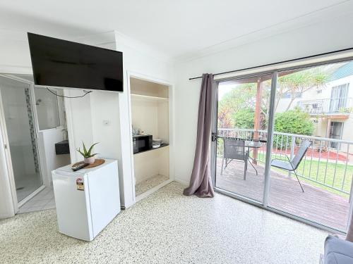 Kuchyň nebo kuchyňský kout v ubytování Emu Park Beach Resort