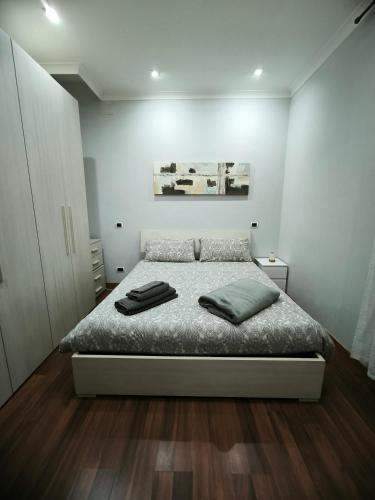 Кровать или кровати в номере Casa Vacanza Giorgia